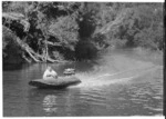 Robert Wells in speedboat on Mokau River