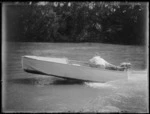 Robert Wells in speedboat on Mokau River