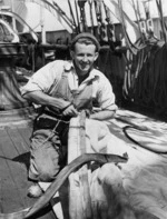 George Gunn repairing a sail aboard the ship Pamir, Wellington