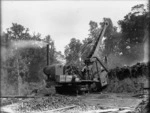 Steam powered earth moving machine operating during railway construction at Ohakune