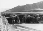 J M Marks, fl 1905 : Waiou River and bridge, with Lochiel Station and homestead, Canterbury