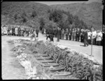 The Duke of Edinburgh at the mass burial after the Tangiwai railway disaster - Photograph taken by E Woollett