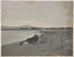 Harold Hislop with friend at Waikanae River mouth