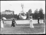 View of rides by the lake at the New Zealand International Exhibition, Christchurch