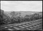 Derailed wagons after a railway accident at Ruatangata near Whangarei, 1923.