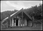 Chief Whatanui in front of Hinenuitepo meeting house at Te Whaiti, 1930
