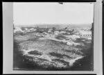 View from Rutland Stockade, Wanganui, of vacant land with Queen's Park School and the township beyond