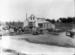 Horse-drawn carts with milk cans at the Ngaere Dairy factory