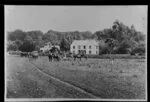 Family members in front of the McBeth homestead, Dunsinane, Marton, Rangitikei