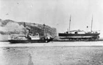 The S S Patea steaming out of the Patea River, and the Wakatu being repaired on the breakwater