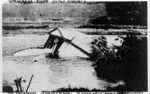 Creamery building partly submerged by flood water, Waikanae