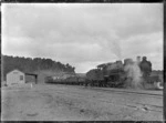 Freight train and steam locomotive at Erua Railway Station