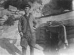A soldier at the entrance to his dug-out, Gallipoli, Turkey