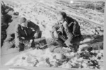 Two New Zealand Soldiers testing ground lines, Italy