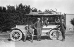 Group at Centre Hill Junction, with service car