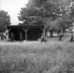 Japanese prisoners of war on their way to eat lunch, at the market gardens near Featherston