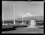 View of Mount Egmont in winter with memorial and lamp posts, New Plymouth