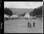 Ministerial party arriving at Horohoro Marae, Taupo district, during the 25th anniversary of the Maori Land Development Scheme - Photograph taken by Edward Percival Christensen