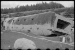 Railway carriage on the bank of the Whangaehu Stream at the scene of the railway disaster at Tangiwai