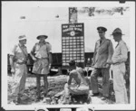 Group around the New Zealand Fighter Wing score board, Odonga (New Georgia), Solomon Islands