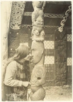 Makereti (Maggie) Papakura sharing a hongi with an unidentified Maori figure at house, Whakarewarewa, Rotorua