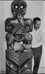 Charles Tuarau with the tekoteko he carved for the meeting house at Waiwhetu, Lower Hutt, Wellington