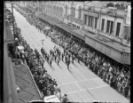 Brass band marching in Willis Street, Wellington