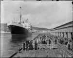 Crowd on a Wellington wharf, farewelling Lord and Lady Freyberg on the ship Rangitane