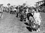 Children walking with their calves during the Egmont Agricultural and Pastoral Show at Hawera