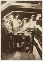 Photograph - Four workers inside Enoch Tonk's Brick Factory