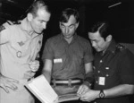 Warrant Officer Class Two Don Allen with French and Singaporean military personnel