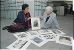 Kiripuai Te Aomarere and Margaret Long with photographs being presented to Alexander Turnbull Library - Photograph taken by Craig Simcox