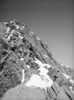 Yunnan, China. Rock peak with Mick Bowie etc. above first high camp. 2 November 1938.
