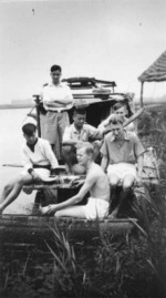 Six youths in a boat