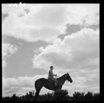 Land girl, June Matthews, on horseback, Mangaorapa, Hawke's Bay