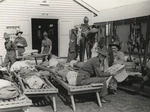 Powell, Arthur Walter, 1893-1970 :Photograph of World War II soldiers of the 3rd Echelon, clearing out their hut at Papakura Military Camp, Auckland