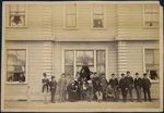 A concert party and friends outside a Nelson hotel