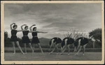 Women taking part in choreographed physical exercise