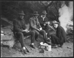 Group of men at old mine landing, Mokau River