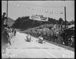 Contestants in New Zealand's first trolley derby crossing the finish line, Karori Park, Wellington
