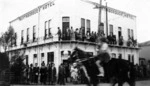 Parade and onlookers in front of the Martinborough Hotel