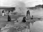 Women preparing food in hot pool, Whakarewarewa