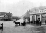Flooding outside the shop of Duncan McLean, Greymouth
