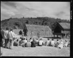 Maori poi dance being performed for American tourists at the Whakarewarewa model pa - Photograph taken by W Walker