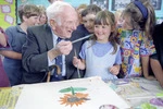 Ngaio School's oldest and youngest pupils, painting a picture for the school's 90th birthday - Photograph taken by John Nicholson