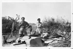 New Zealand soldiers by an Italian machine gun turret emplacement, in Italy, during World War II