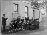 Group of school boys playing fifes