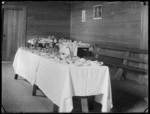 Trestle table laden with food at the opening of the new fire station on the Hutt Road at Silverstream, 1938