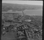 Aerial over Point Chevalier showing the North-Western motorway under construction, Auckland