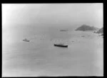 Royal Yacht Britannia and escort entering Bay of Islands